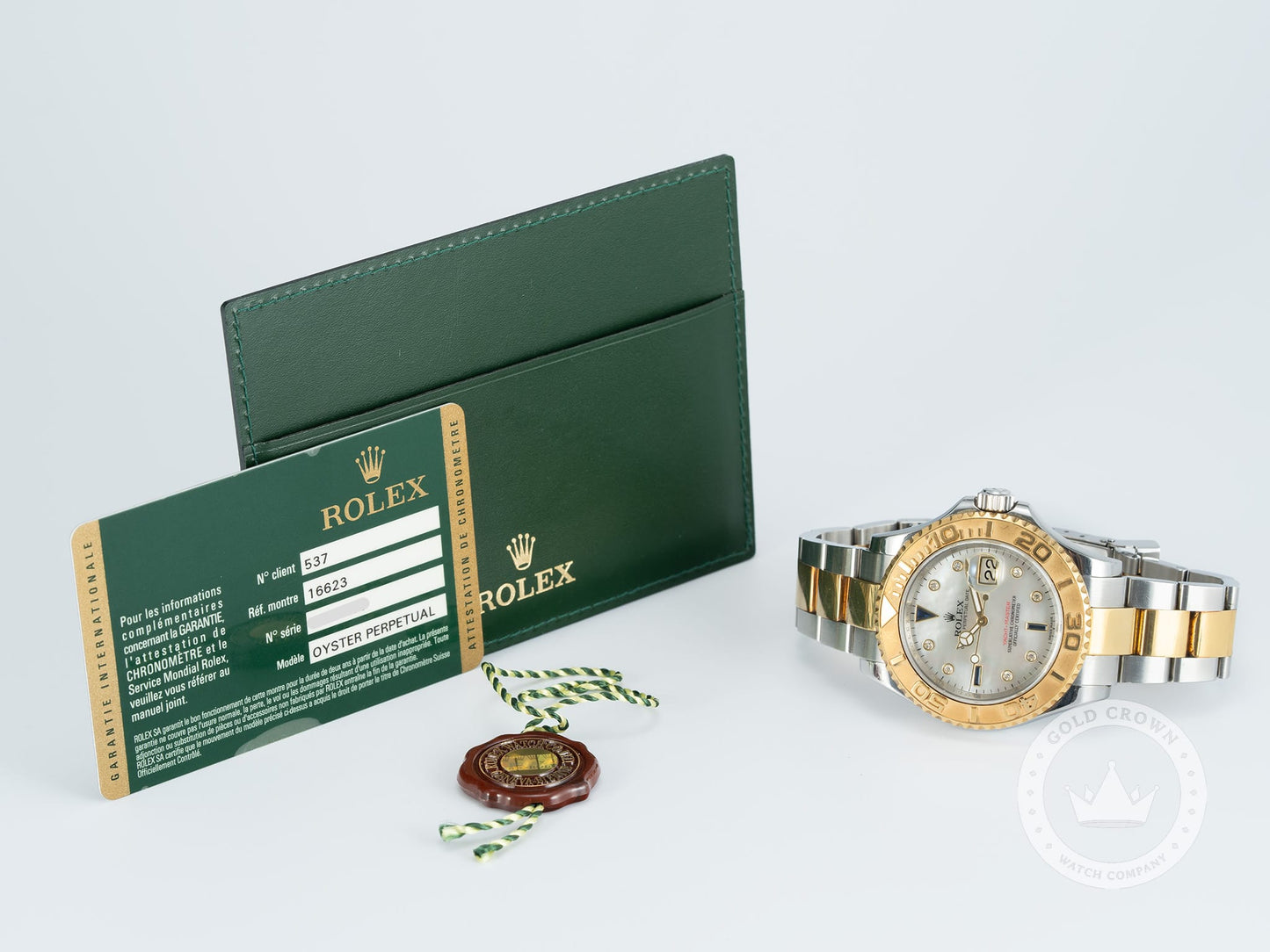 Rolex Yacht-Master 16623 “Factory MOP Serti Dial” Watch, Paper, and Manual