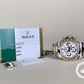 Rolex Daytona 116503 Watch and Paper