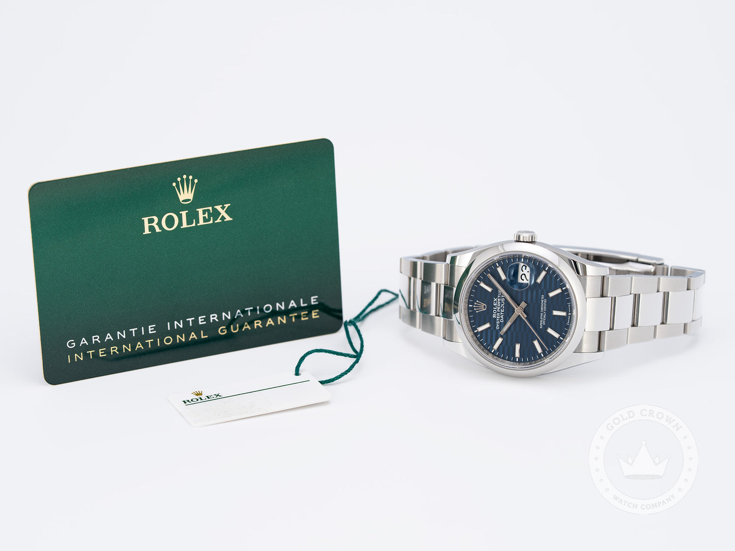 Rolex Datejust 126200 “Blue Motif Dial” Watch and Paper